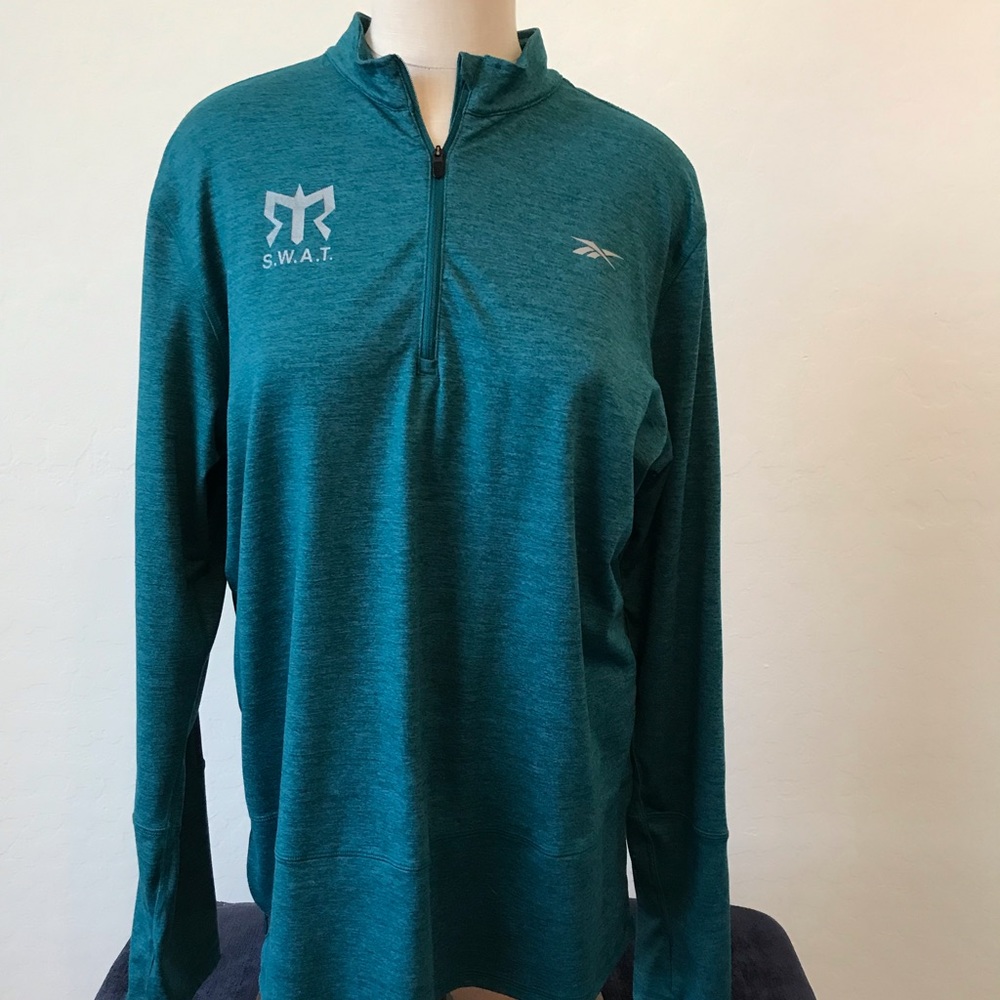 Reebok Ragnar race SWAT Jacket Large Teal Green thumb holes.